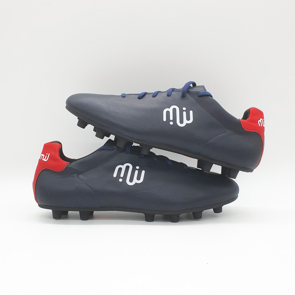 Chaussure de football à crampons pour terrain synthétique